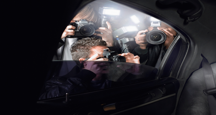 Paparazzi Shooting Through Car Window